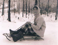 Linda on a snowsled